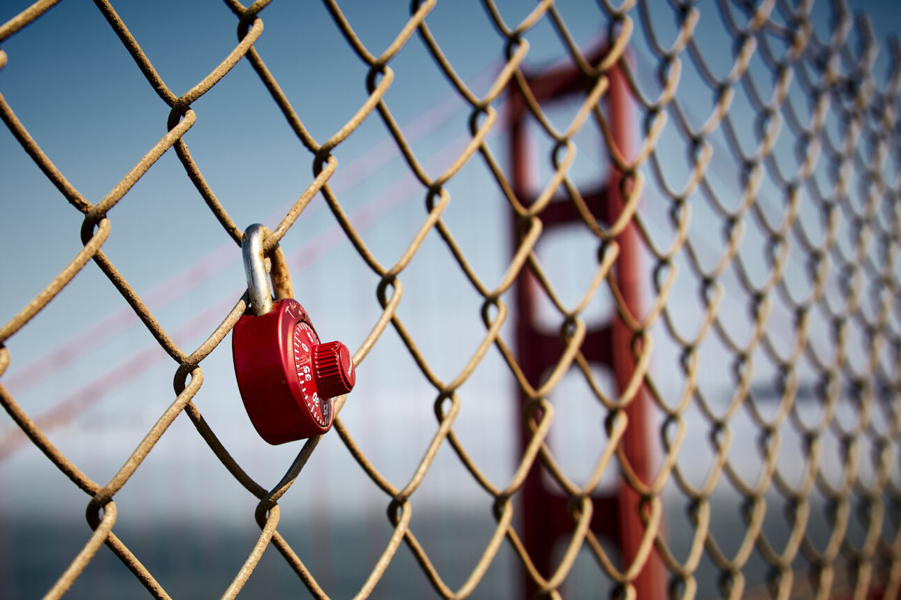 Padlocked fence on building site